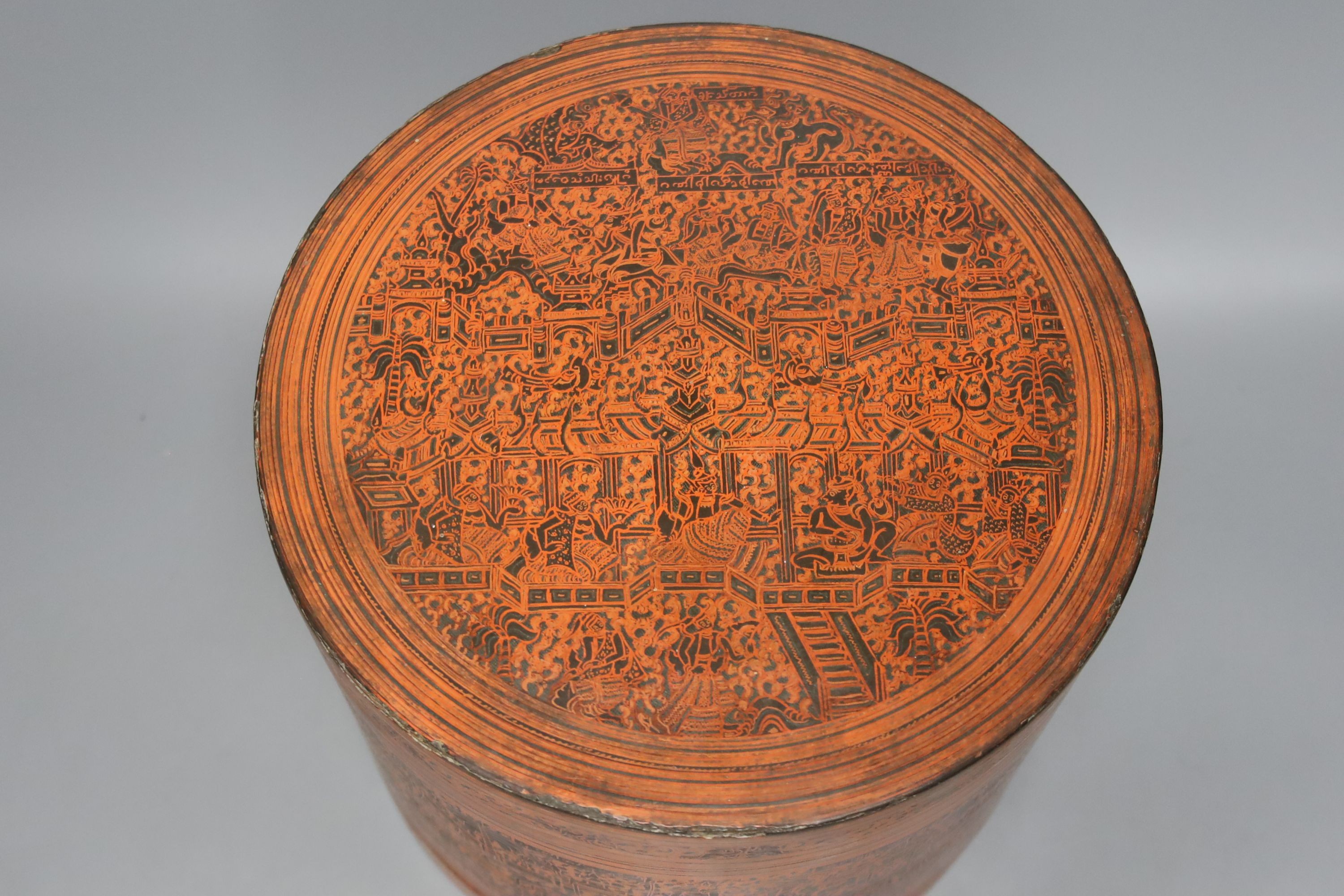 A large Burmese red and black lacquer betel box and cover with internal tray, late 19th century, 22cm